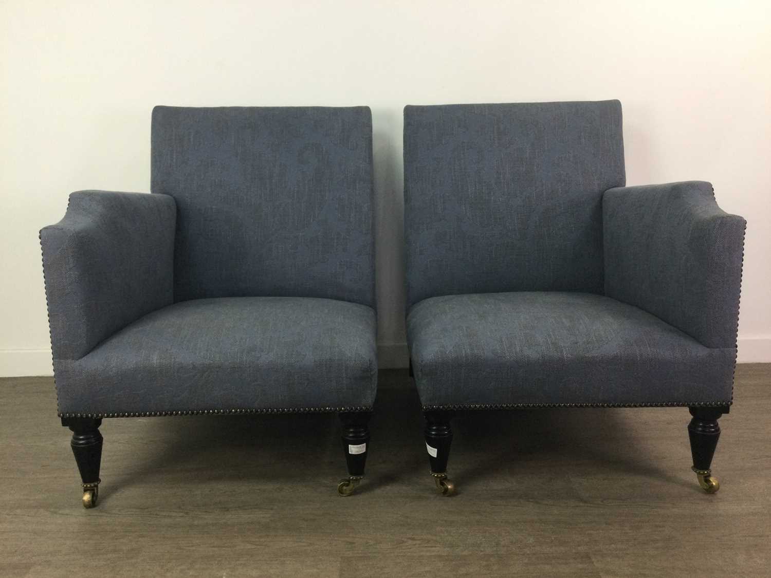 Lot A PAIR OF CORNER CHAIRS OF CONTEMPORARY DESIGN