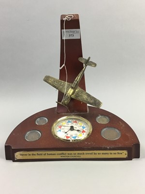 Lot 373 - AN RAF THEMED DESK CLOCK, ALONG WITH THREE PLATES AND A PICTURE