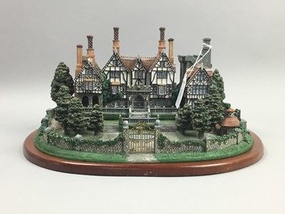 Lot 390 - A COLLECTION OF MODEL BUILDINGS AND COTTAGES