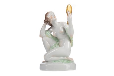 Lot 354 - A HEREND PORCELAIN NUDE FIGURE OF A LADY