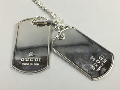 Lot 425 - A DOUBLE DOG TAG NECKLACE