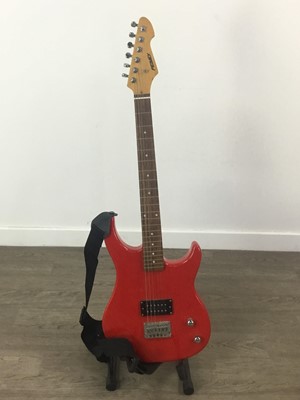Lot 385 - A PEAVEY ELECTRIC GUITAR ALONG WITH A ROLAND MICROCUBE AMPLIFIER