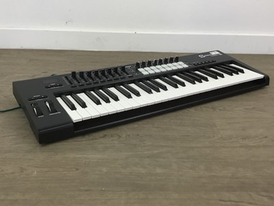 Lot 512 - A NOVATION KEYBOARD AND ORGAN