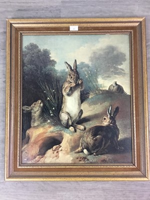 Lot 432 - A FRAMED PRINT OF MARCH HARES