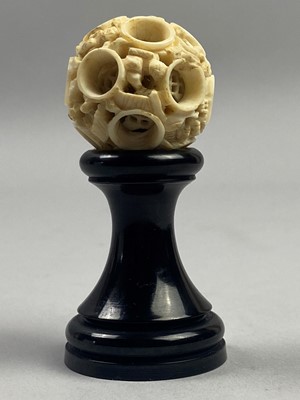 Lot 887 - A CHINESE CARVED IVORY CONCENTRIC PUZZLE BALL
