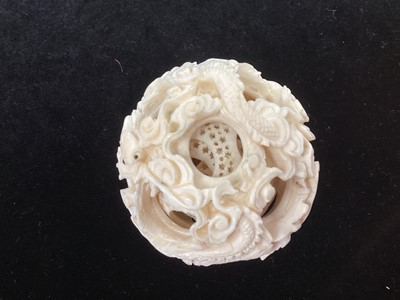Lot 887 - A CHINESE CARVED IVORY CONCENTRIC PUZZLE BALL