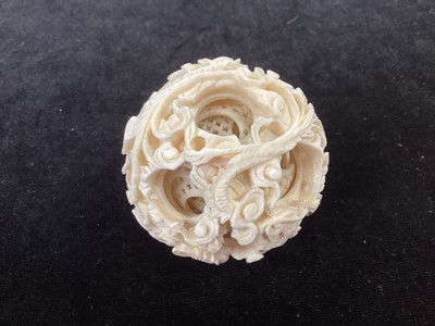 Lot 887 - A CHINESE CARVED IVORY CONCENTRIC PUZZLE BALL