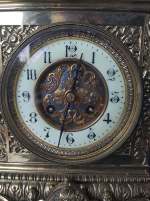 Lot 590 - A LATE 19TH CENTURY FRENCH BRASS MANTEL CLOCK
