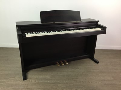 Lot 651 - A ROLAND ELCTRONIC KEYBOARD WITH STOOL