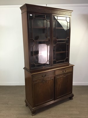 Lot 570 - A MAHOGANY BOOKCASE ON CHEST