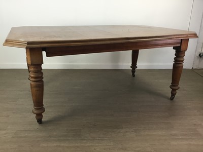 Lot 573 - A VICTORIAN OAK EXTENDING DINING TABLE