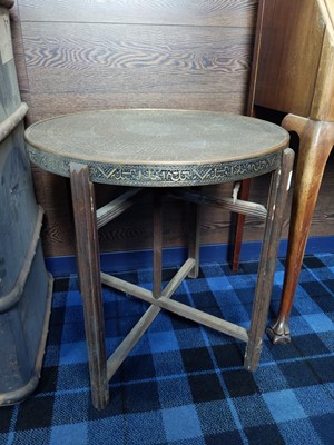 Lot 580 - AN EASTERN BRASS TOPPED TABLE