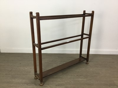 Lot 592 - A MAHOGANY TOWEL RAIL