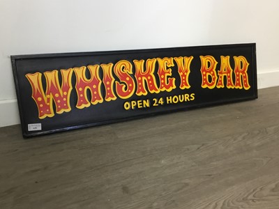 Lot 638 - A HAND CARVED 'WHISKEY BAR' WALL SIGN