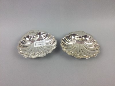 Lot 691 - A PAIR OF SILVER SHELL BUTTER DISHES