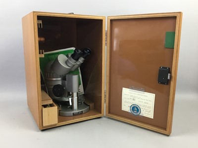 Lot 694 - AN OLYMPUS MICROSCOPE AND BRASS WEIGHTS