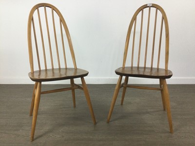 Lot 363 - AN ERCOL DINING TABLE AND SIX HOOP BACK CHAIRS