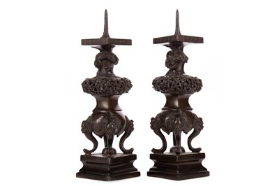 Lot 1088 - A PAIR OF CHINESE BRONZE PRICKET CANDLESTICKS