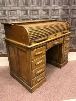 Lot 1233 - OAK ROLL TOP DESK the shutter front enclosing...