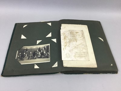 Lot 24 - AN ALBUM OF WWII ERA POSTCARDS AND SCRAPS