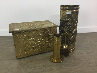 Lot 270 - AN EMBOSSED BRASS LOG BOX AND STICK STAND