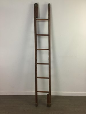 Lot 592 - A STUDDED LEATHER METAMORPHIC LIBRARY POLE LADDER