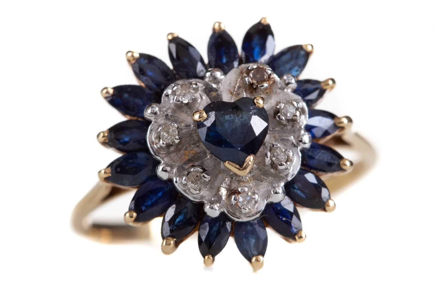 Lot 453 - A SAPPHIRE AND DIAMOND HEART RING