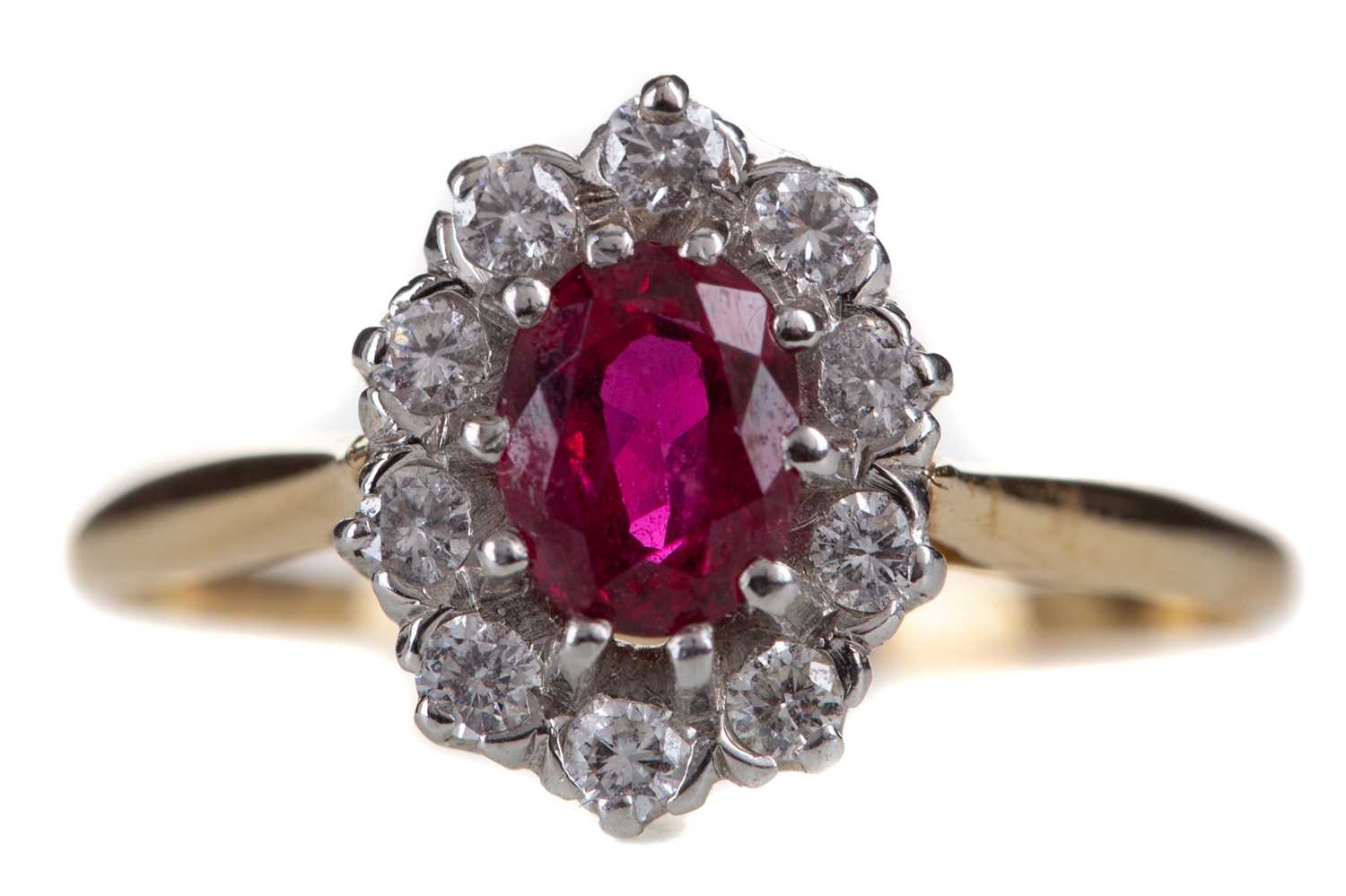 Lot 455 - A RUBY AND DIAMOND CLUSTER RING