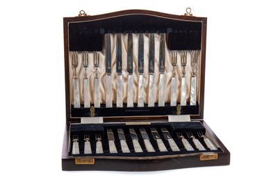 Lot 138 - A SET OF TWELVE SILVER & MOTHER OF PEARL PASTRY KNIVES & FORKS