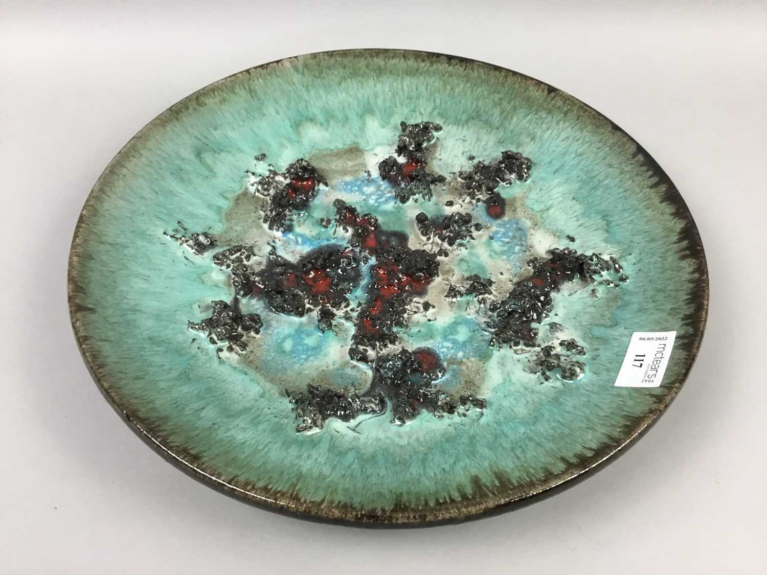 Lot 117 - A GLIT ICELANDIC STUDIO POTTERY 'LAVA' CIRCULAR PLATE