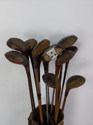Lot 246 - A COLLECTION OF GOLF CLUBS IN TWO CARRY BAGS