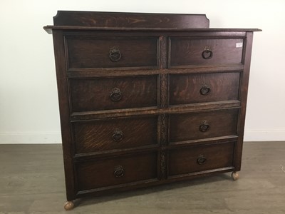 Lot 435 - AN OAK CHEST OF DRAWERS