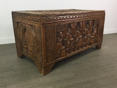 Lot 387 - A WEST AFRICAN CARVED HARDWOOD BLANKET CHEST