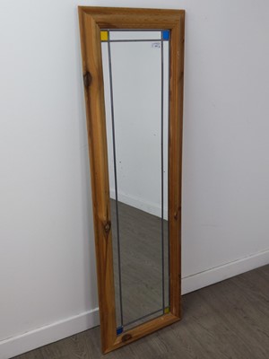 Lot 450 - AN UPRIGHT WALL MIRROR AND TWO FLOOR LAMPS