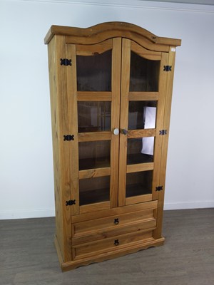 Lot 451 - A PINE TWO DOOR BOOKCASE