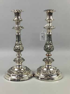 Lot 401 - A PAIR OF PLATED CANDLESTICKS