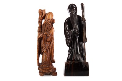 Lot 409 - TWO CARVED WOODEN FIGURES OF SHOU LAO
