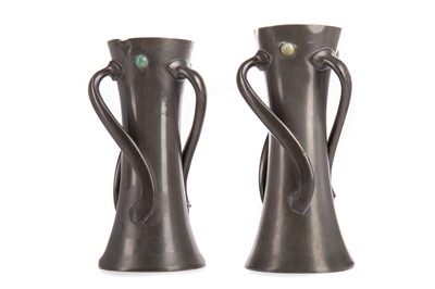 Lot 395 - A MATCHED PAIR OF LIBERTY TUDRIC PEWTER VASES
