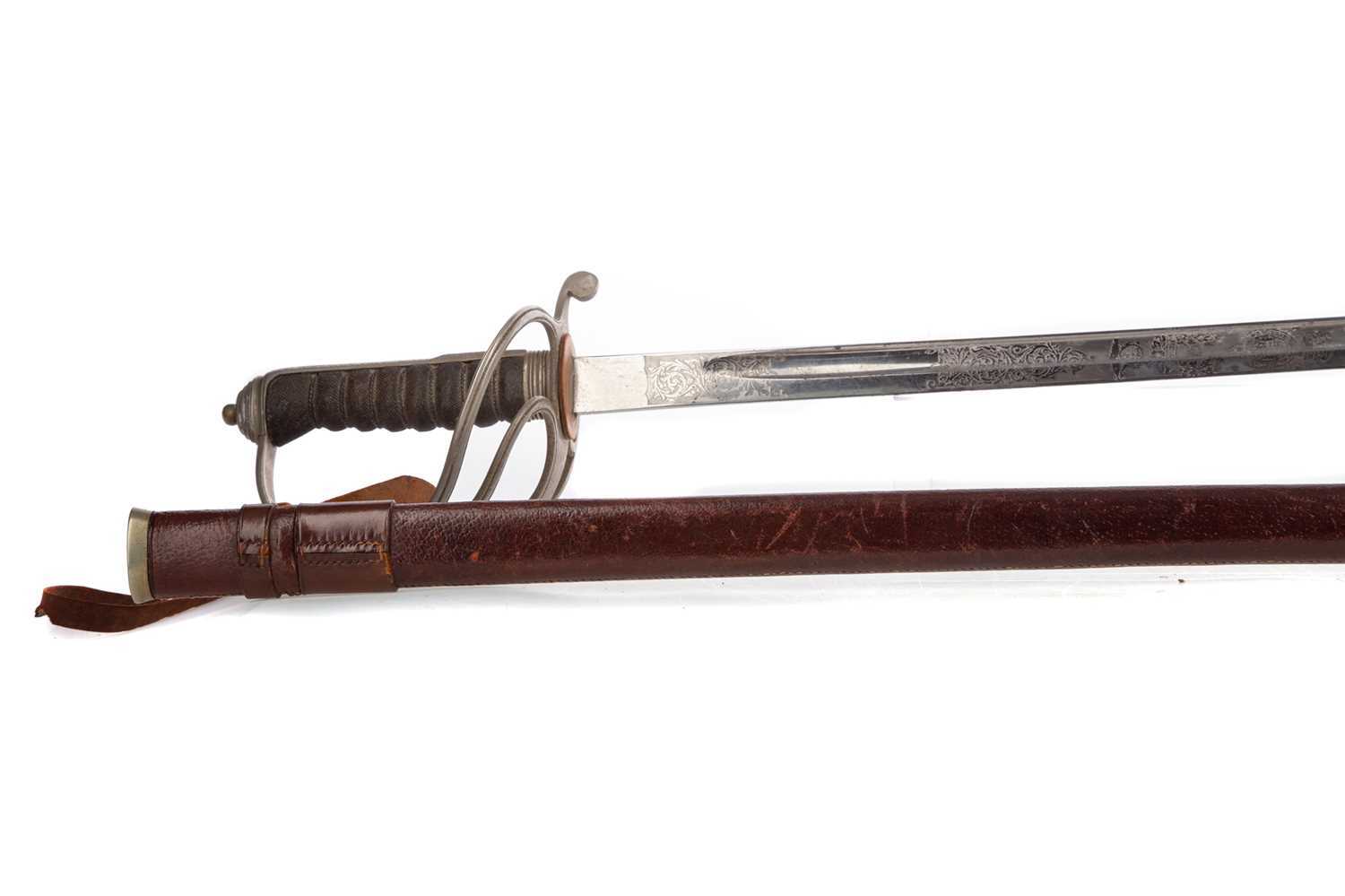 Lot 21 - A ROYAL ARTILLERY OFFICERS DRESS SWORD AND SWAGGER STICK