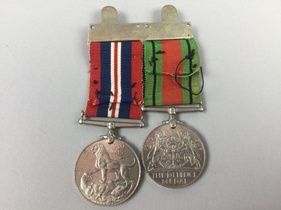 Lot 422 - A LOT OF TWO WWII SERVICE MEDALS WITH OTHER TOKENS AND MEDALS