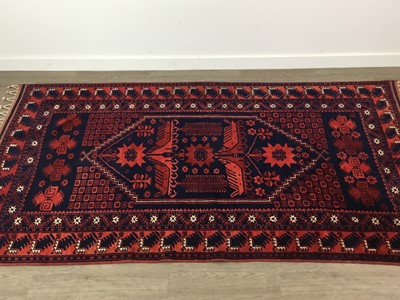 Lot 256 - A MODERN RUG