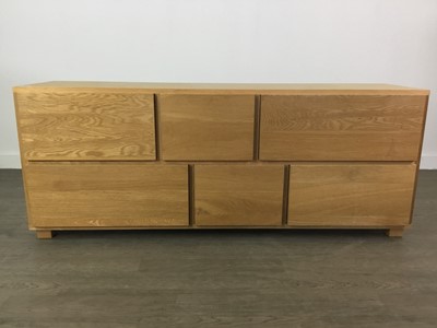 Lot 240 - A MODERN OAK LOW CHEST OF DRAWERS