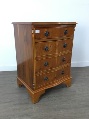 Lot 242 - A REPRODUCTION YEW WOOD SERPENTINE FRONTED CHEST AND A PINE CHEST OF DRAWERS