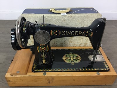 Lot 255 - A SINGER SEWING MACHINE IN CARRY CASE