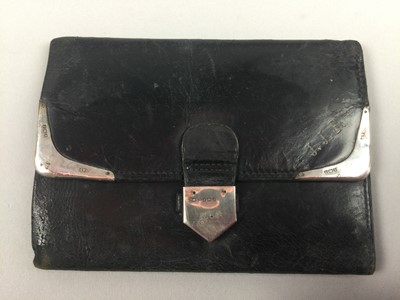 Lot 69 - A LOT OF TWO VINTAGE LEATHER WALLETS