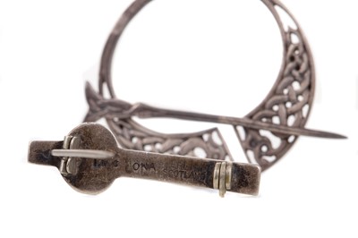 Lot 702 - TWO IONA SILVER BROOCHES