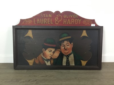 Lot 294 - A LAUREL & HARDY PAINTED ADVERTISEMENT BOARD