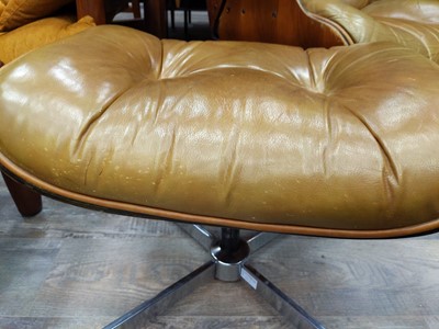 Lot 412 - A PLYCRAFT RECLINER AND OTTOMAN AFTER RAY & CHARLES EAMES