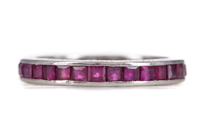 Lot 727 - A PARTIAL RUBY ETERNITY RING