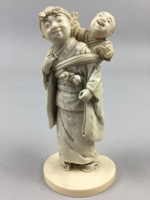 Lot 328 - A JAPANESE IVORY OKIMONO